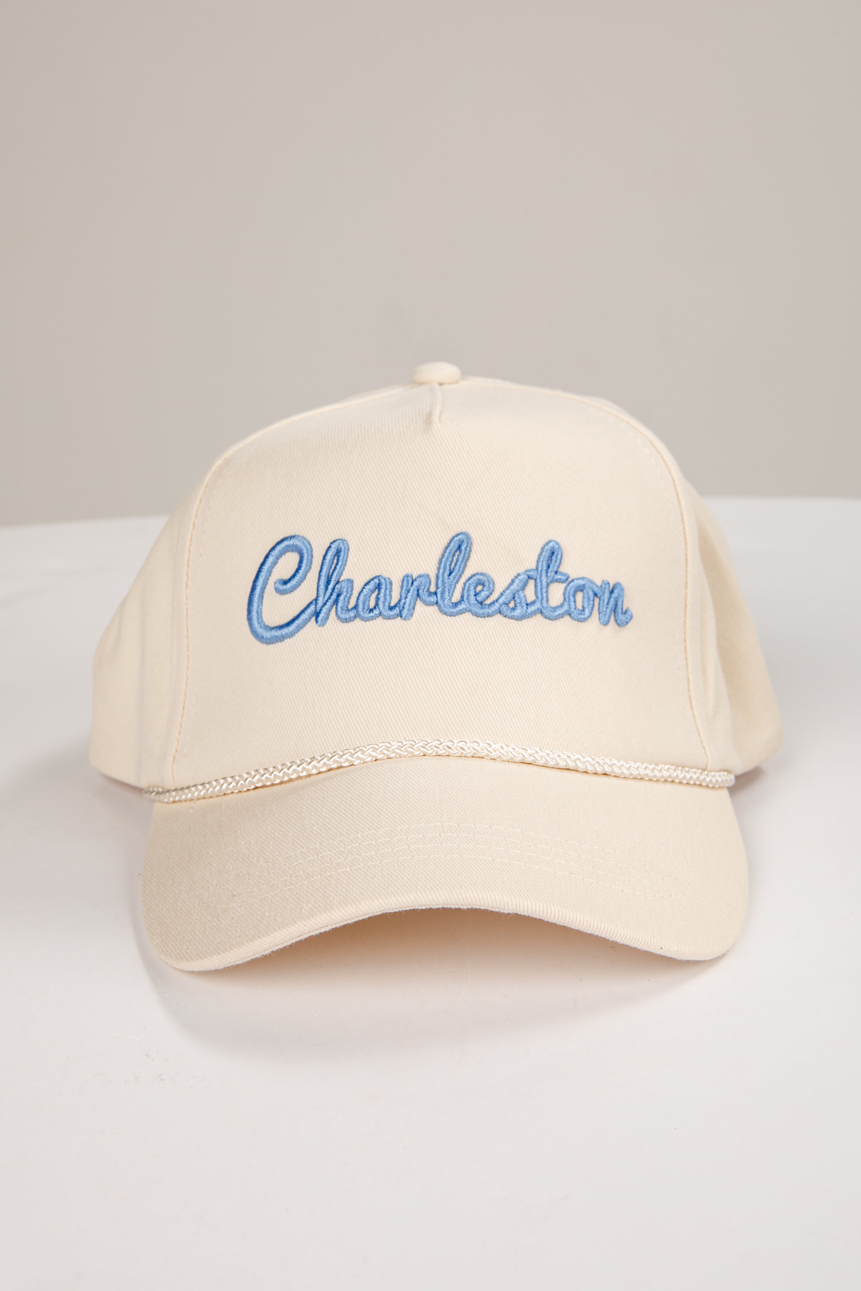 Beige cap with &