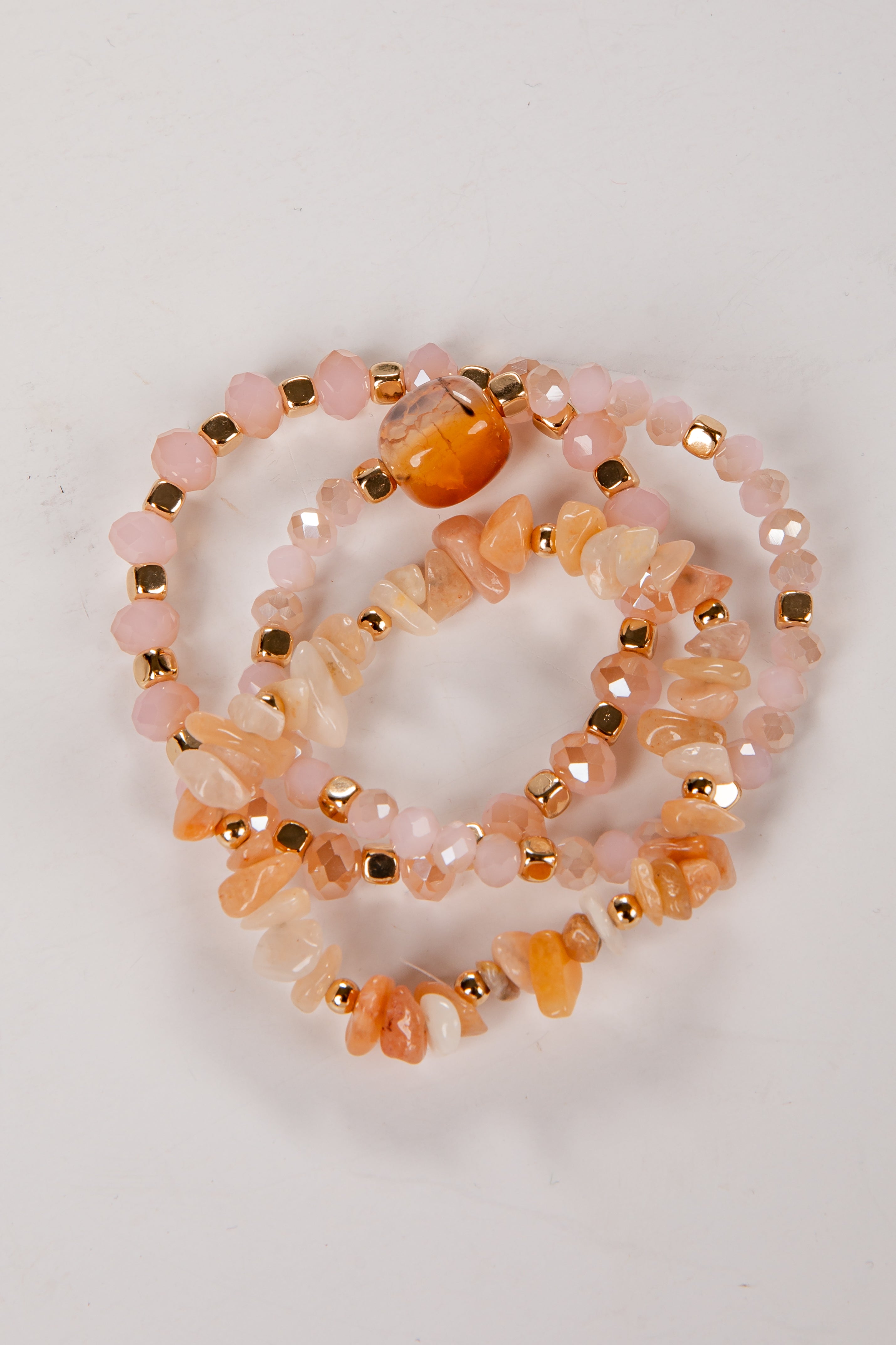 pink and gold beaded bracelet set