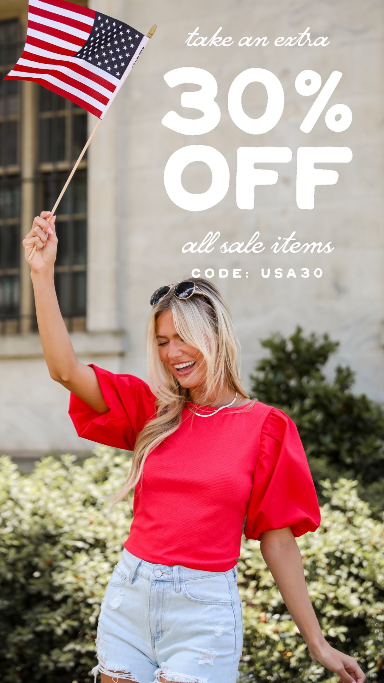 model promoting Ruby White Wear's extra 30% off sale items