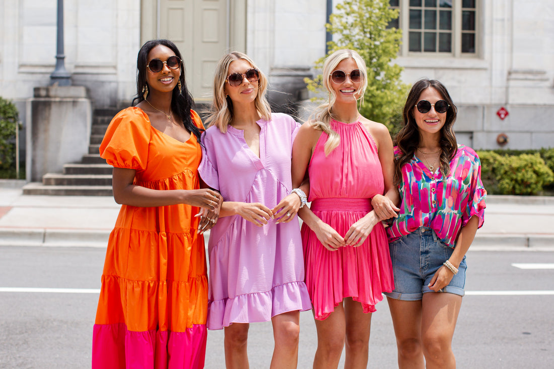 models wearing bright colored outfits