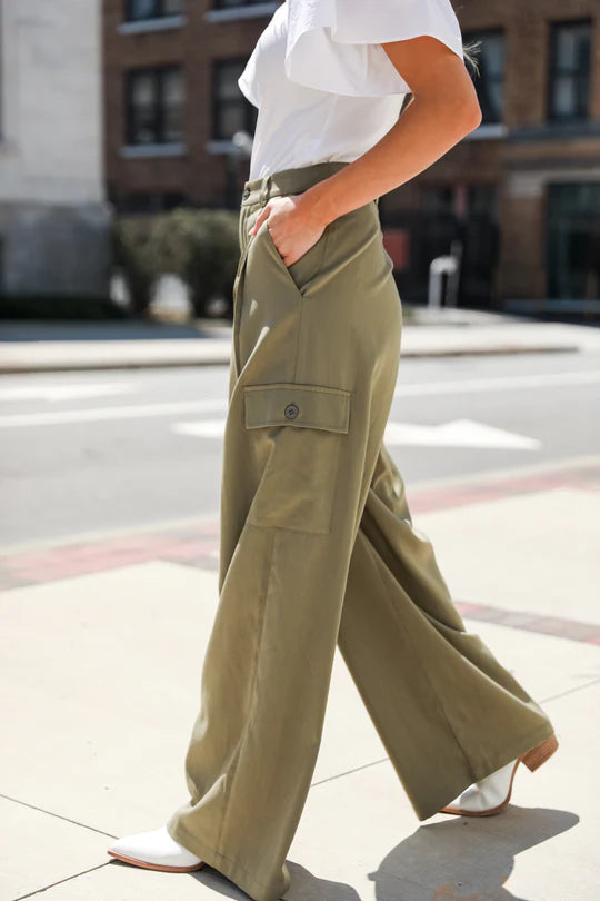 Image of Ruby White Wear model wearing white shirt and green cargo pants