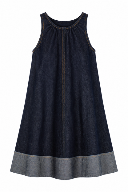 A sleeveless dark blue denim dress with a contrasting heather gray ruffled hem, shown against a plain white background.