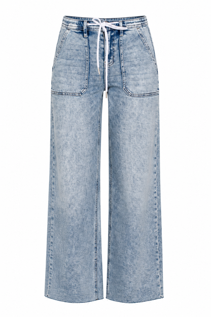 Light blue wide-leg denim jeans with a drawstring waistband and front patch pockets, shown on a plain white background.