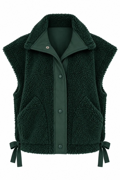 A dark forest green fleece vest with a button-up front, ribbed collar, and matching green tie-bows at the bottom corners, shown against a plain white background.