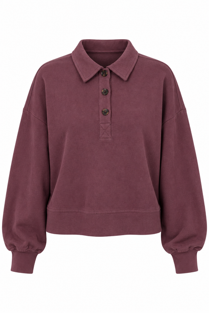 A dusty mauve-brown long-sleeve polo sweatshirt with a three-button placket, shown against a plain white background.