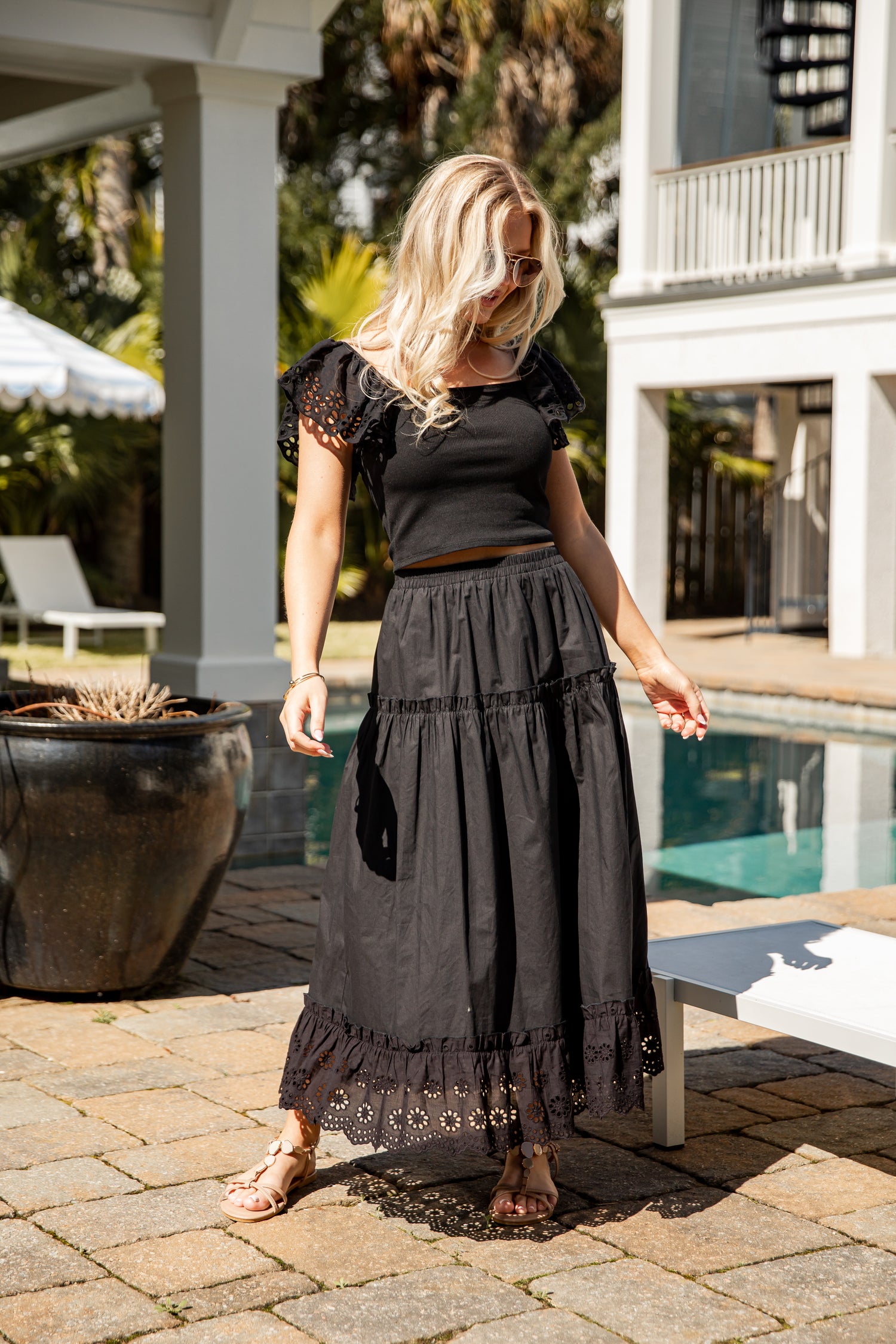 Black tiered maxi skirt styled outdoors
