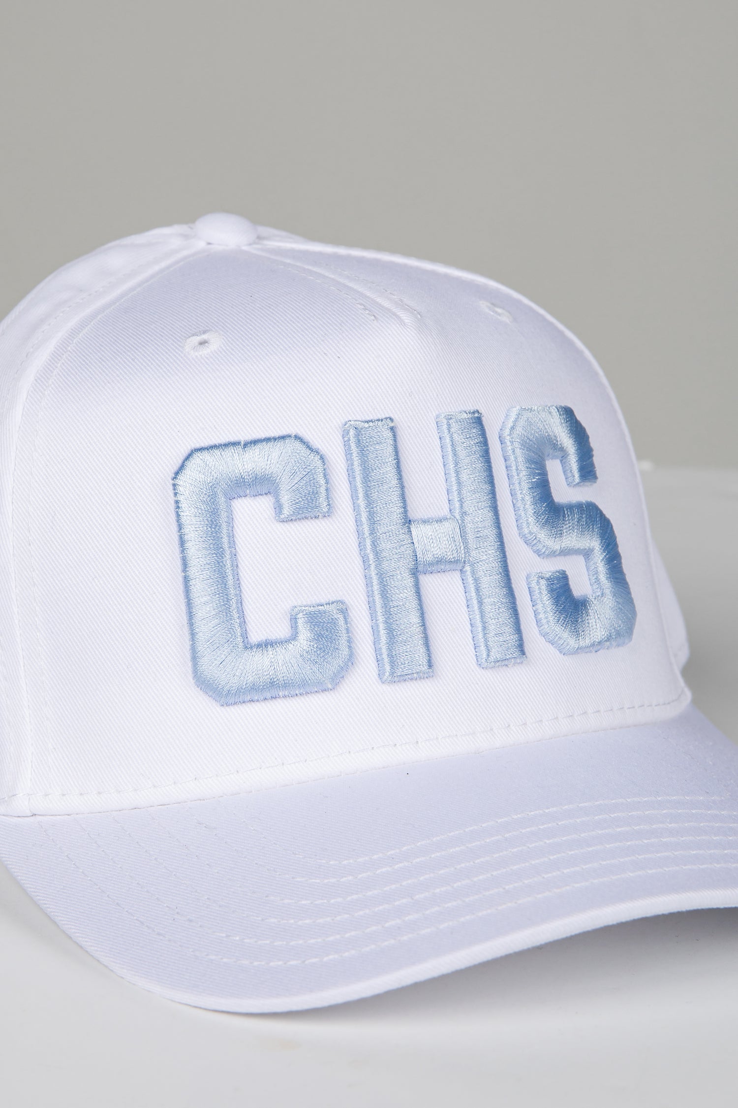 White cap with &