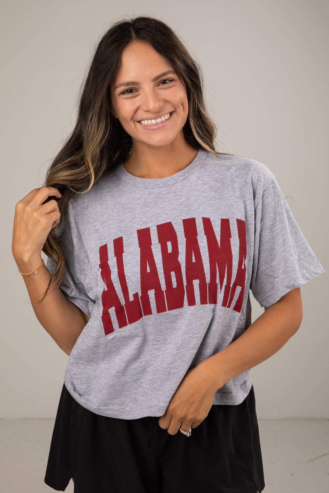Woman wearing a gray &