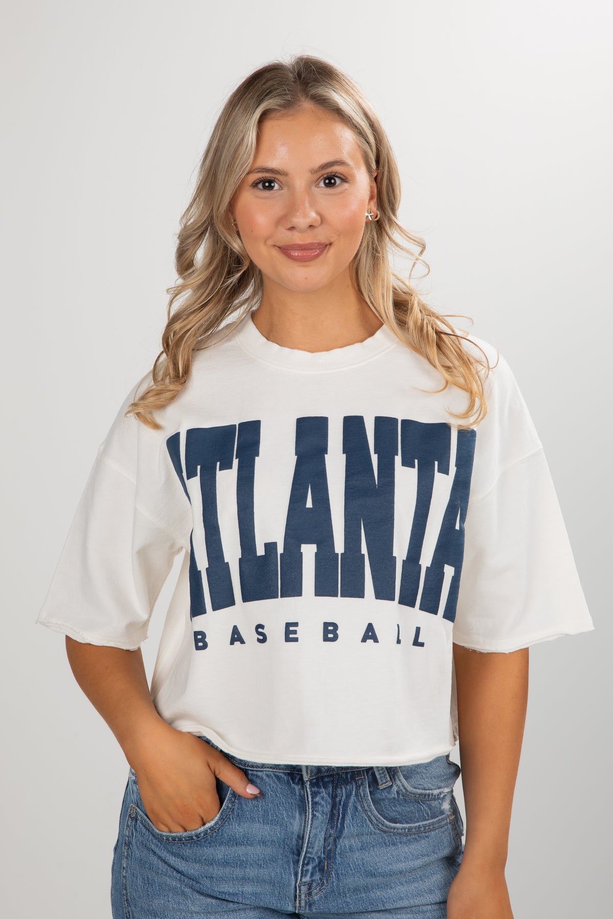 Woman wearing a white t-shirt with &