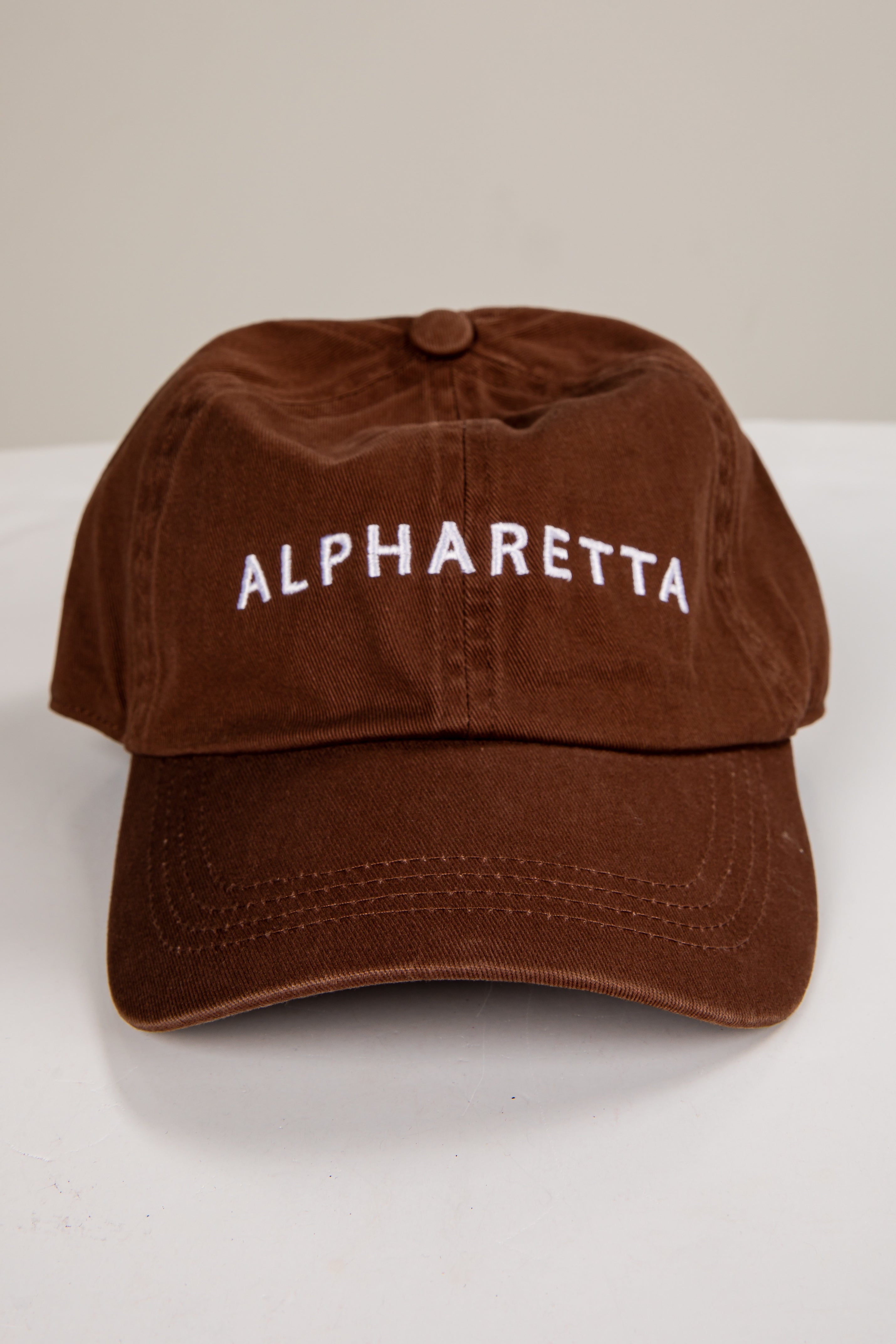 Brown cap with &