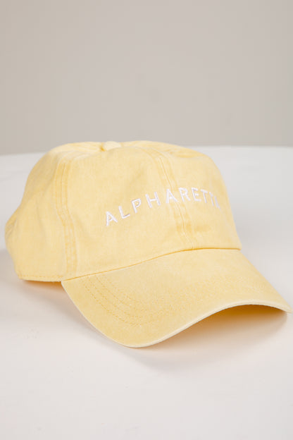 Yellow cap with &