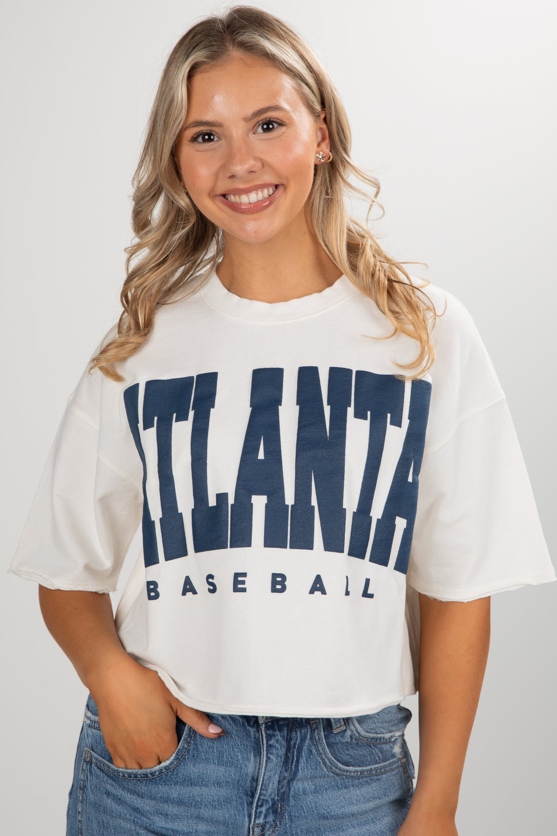 Woman wearing a white t-shirt with &
