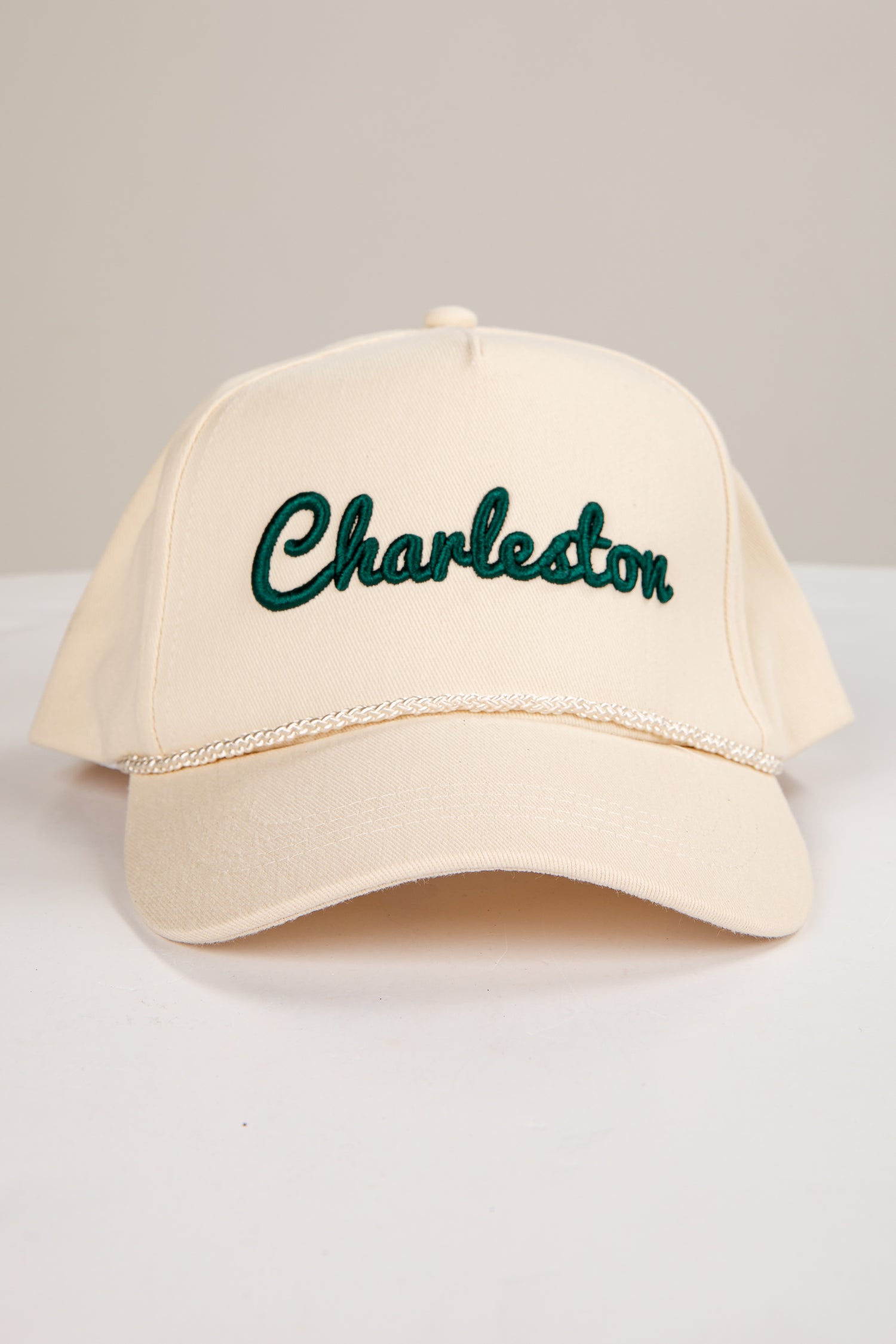 Beige cap with &