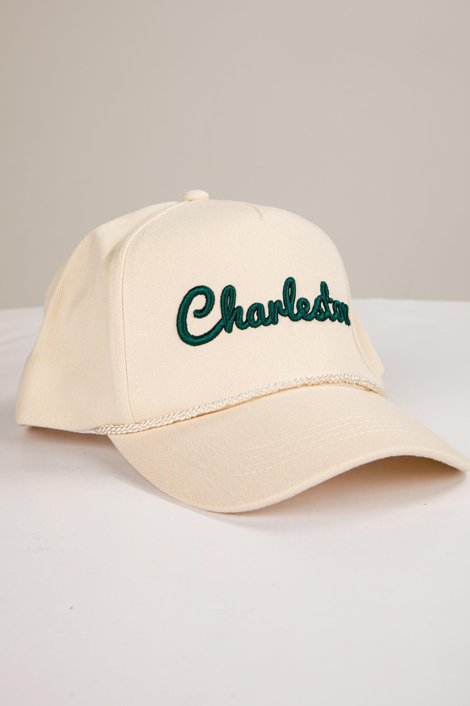 Beige cap with &