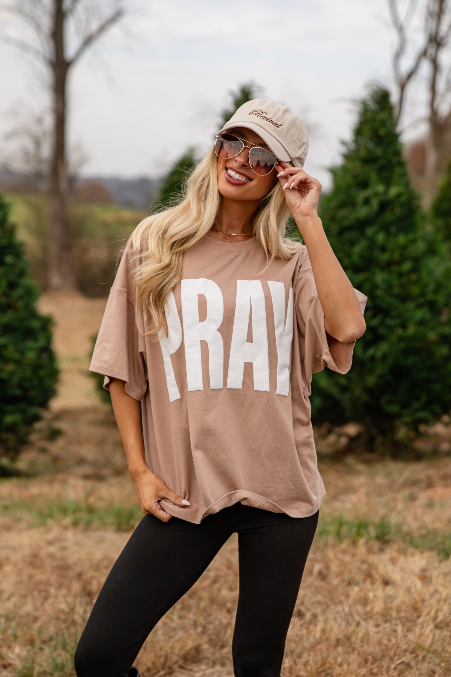 Woman wearing a beige &