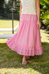 Pink lace-trim maxi skirt styled in sunshine