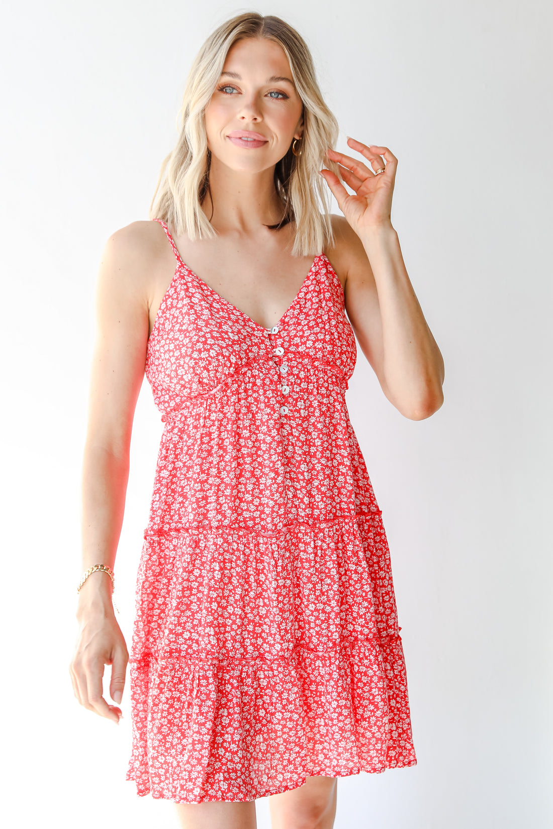 Tiered Floral Mini Dress in red on model